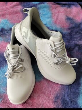 Size 8.5 FootJoy Women's Fuel spikeless golf shoes in white and gray
